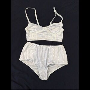 Light blue mesh lingerie set with stars and bows. Never worn. Fits small.
